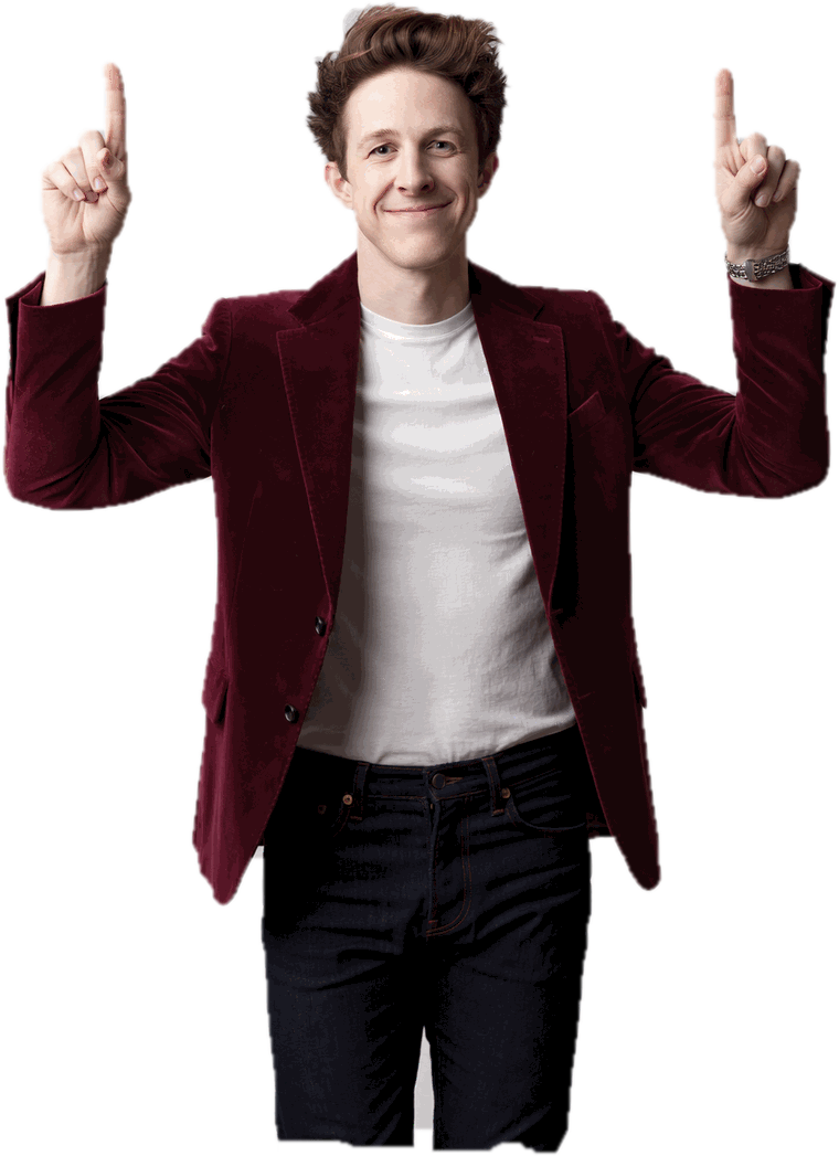 Stephen Ridley in a burgundy velvet jacket, smiling and gesturing toward the sign-up form